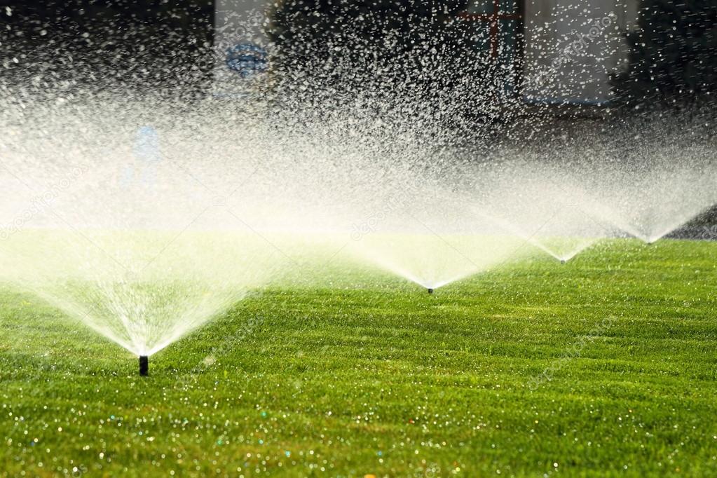 depositphotos_52564687-stock-photo-garden-sprinkler-on-the-green